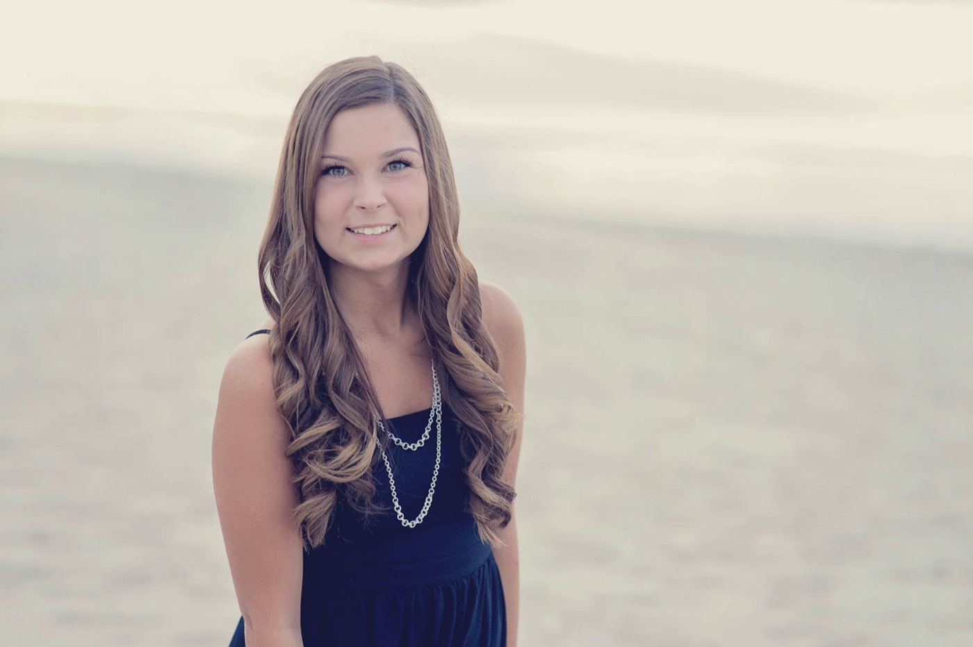 High school senior portrait outdoors